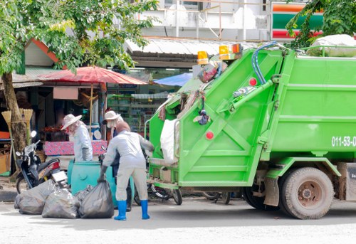 Workers handling demolition waste