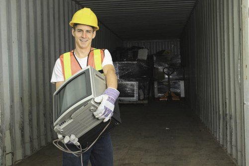 Customer service representative assisting with grab hire booking